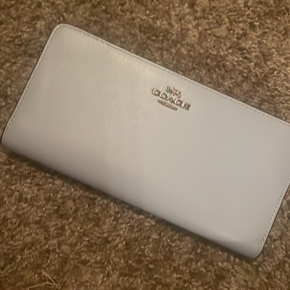 Coach skinny wallet.
